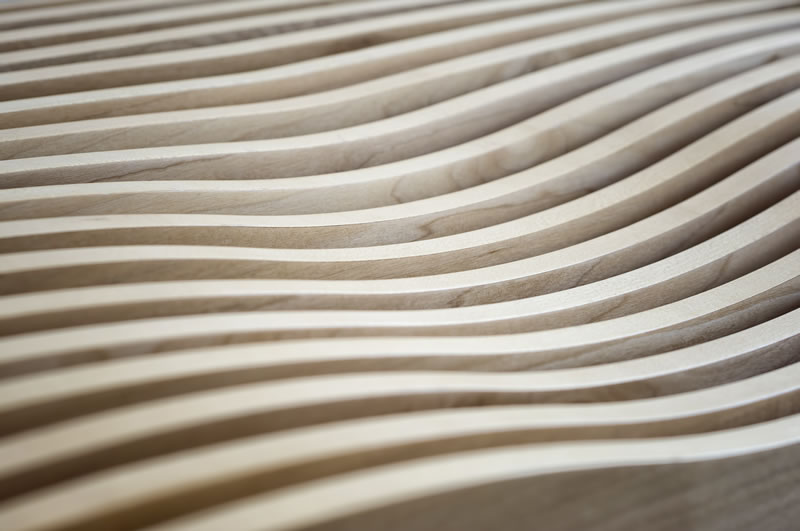 Wooden curved slats with the word CREATE